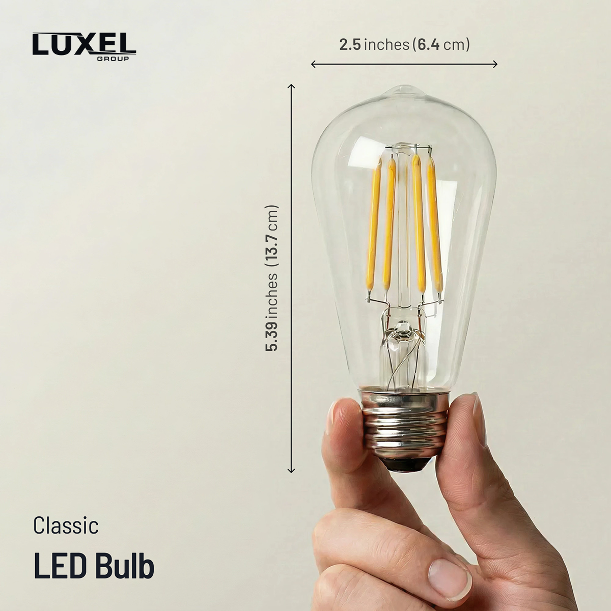 Luxel classic LED bulb with dimensions and a hand holding it against a neutral background